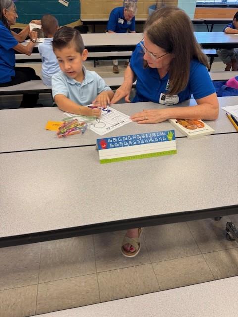 student with a reader